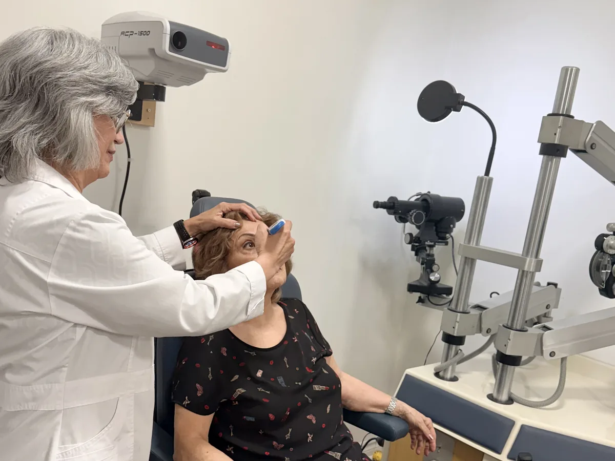 Dr. Roxanna Gangi checking a patient's eye pressure during glaucoma screening at her York Region clinic